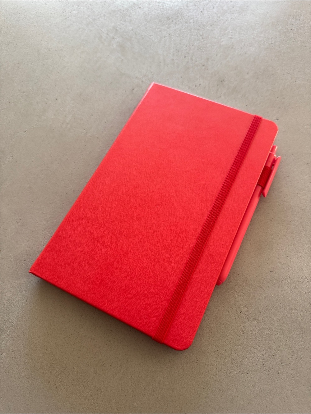 NWOT FEELA CORAL/RED HARDBACK NOTEBOOK WITH PEN